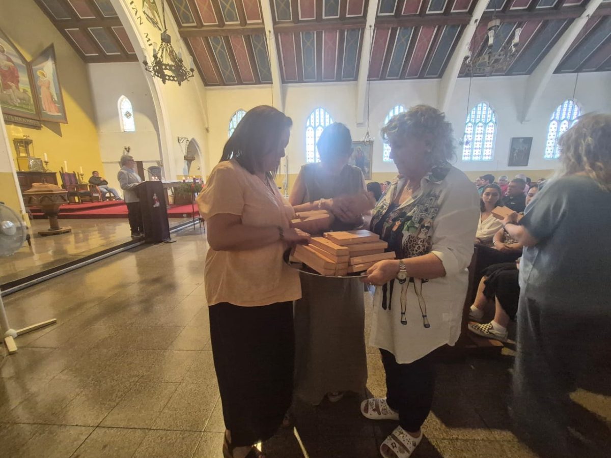 Funcionarios del Colegio San Marcos celebra la Luz de la Navidad