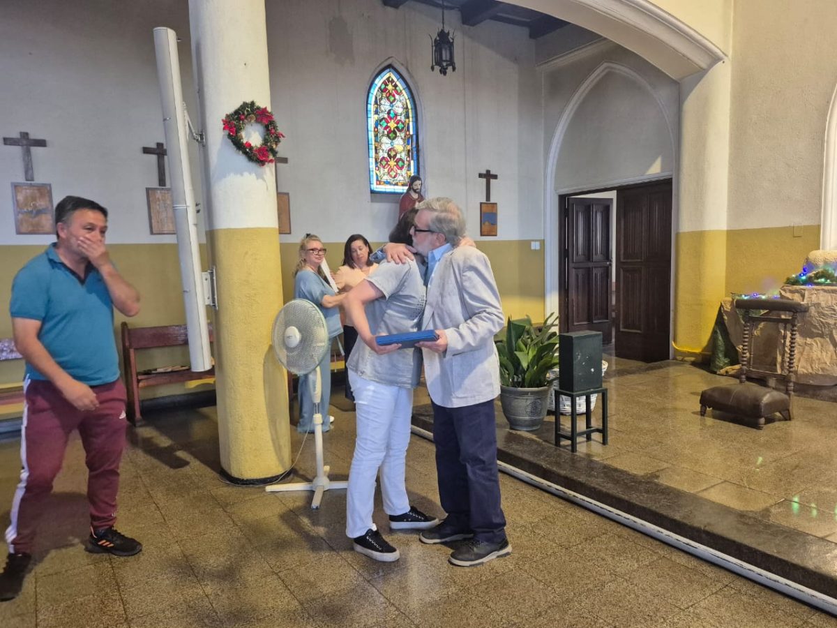 Funcionarios del Colegio San Marcos celebra la Luz de la Navidad