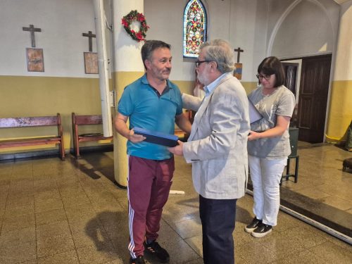 Funcionarios del Colegio San Marcos celebra la Luz de la Navidad