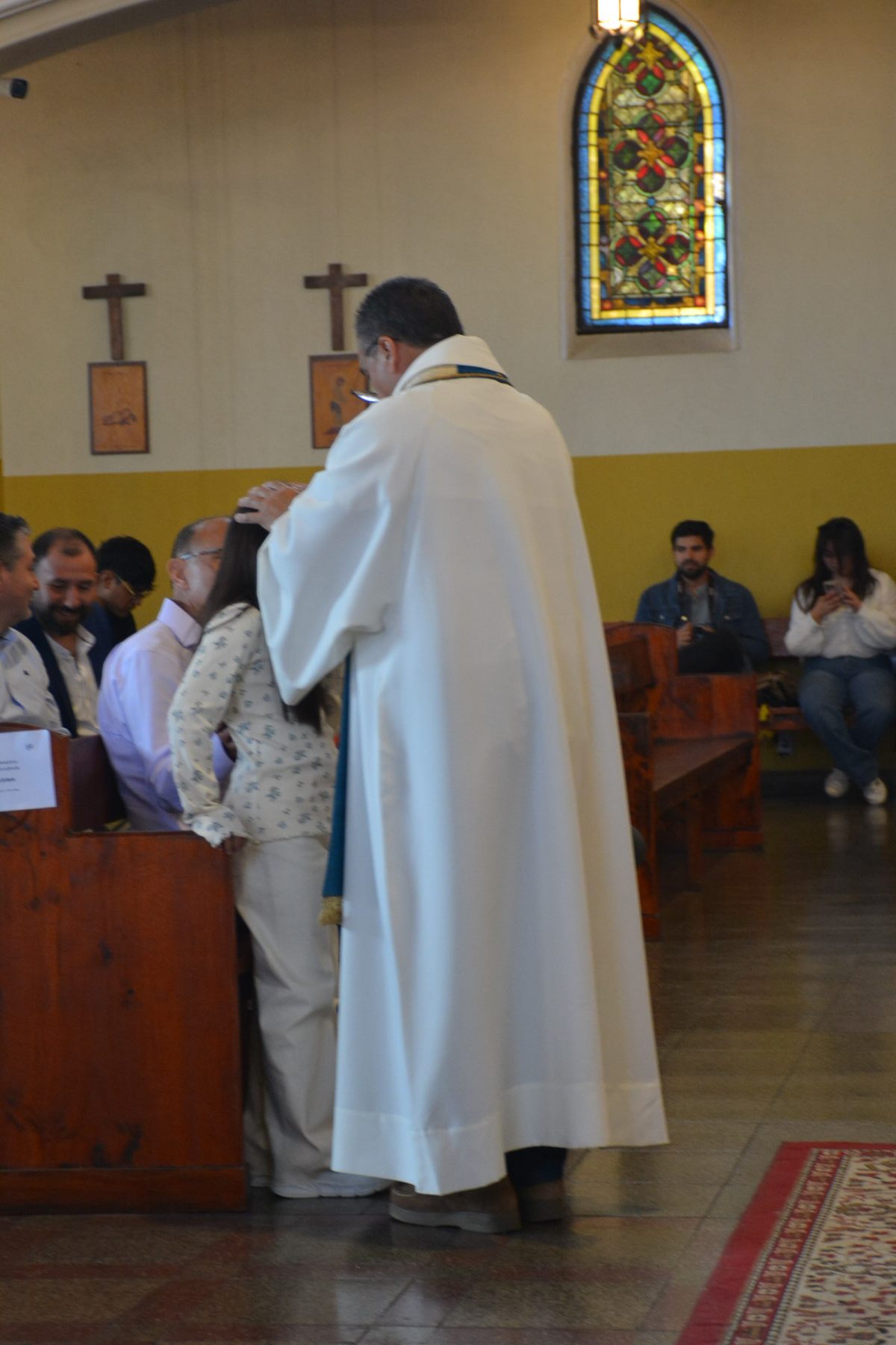Bautismo de estudiantes de la catequesis de Primera Comunión